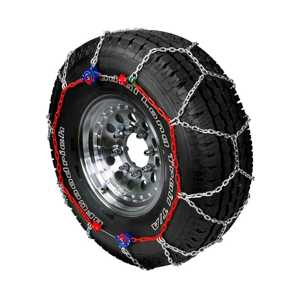 Diamond-pattern steel snow chains installed on off-road tire, designed for strong grip in deep snow and icy conditions